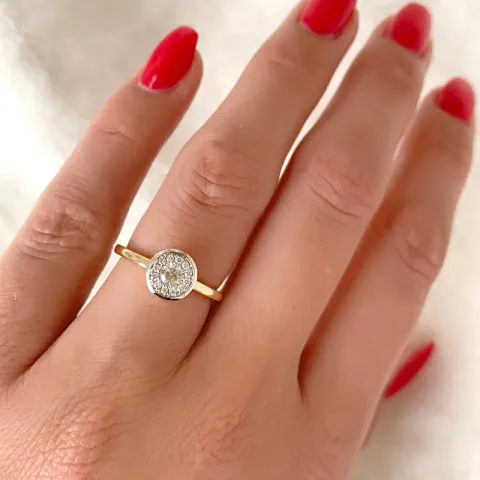 pyöreä timanttisormus 14 karaatin kulta ja valkokultaa 0,15 ct 0,09 ct