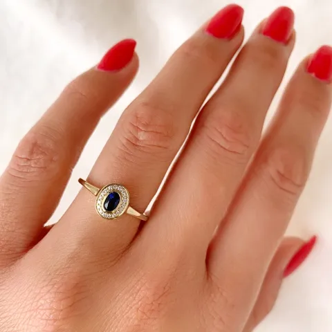 ovaali safiiri briljanttisormus 14 karaatin kultaa 0,35 ct 0,072 ct