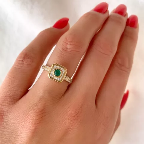 neliskulmainen smaragdi timanttisormus 14 karaatin kultaa 0,22 ct 0,308 ct