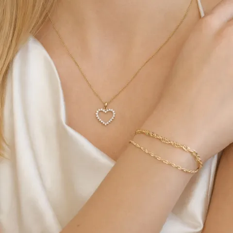 sydän timantti riipus 14 karaatti kultaa 0,33 ct