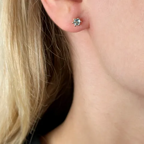 2 x 0,25 ct akvamariinia solitaire-nappikorvakorut 14 karaatin kultaa kanssa akvamariinia