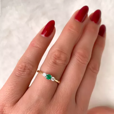 Smaragdi sormus 14 karaatin kulta ja valkokultaa 0,132 ct 0,22 ct