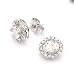 Ovaaleja korvarenkaat 9 karaatin valkokultaa kanssa zirkoni