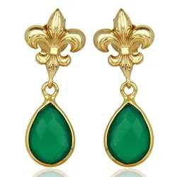 fleur de lis korvarenkaat kullattua hopeaa