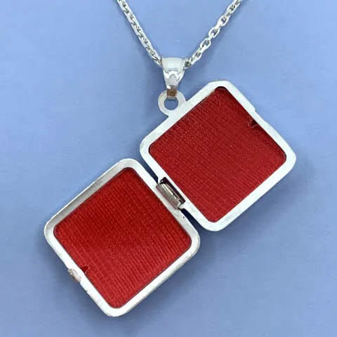 medaljonki hopeaa