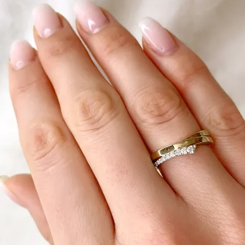 abstrakti timanttisormus 14 karaatin kulta ja valkokultaa 0,115 ct