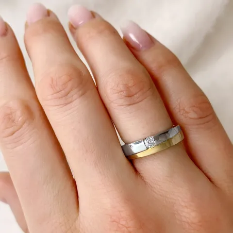 abstrakti timantti sormus 14 karaatin kulta ja valkokultaa 0,1 ct