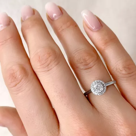 pyöreä timantti valkokulta sormus 14 karaatin valkokultaa 0,257 ct