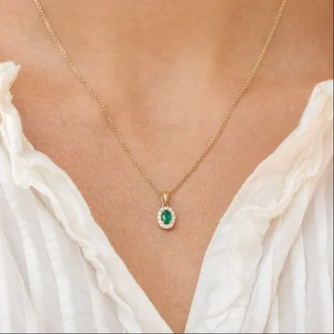 ovaali smaragdi timanttiriipus 14 karaatti kultaa 0,25 ct 0,15 ct