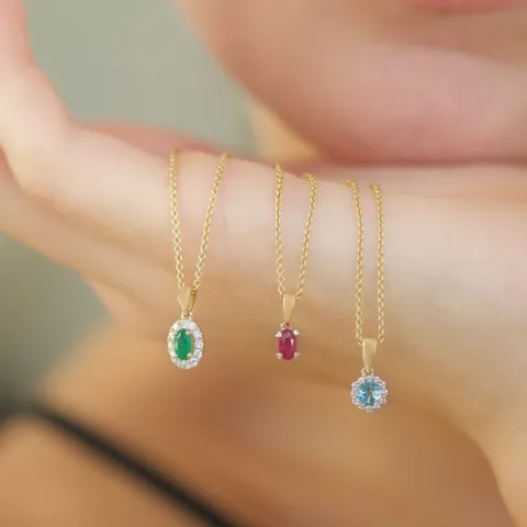 ovaali smaragdi timanttiriipus 14 karaatti kultaa 0,25 ct 0,15 ct