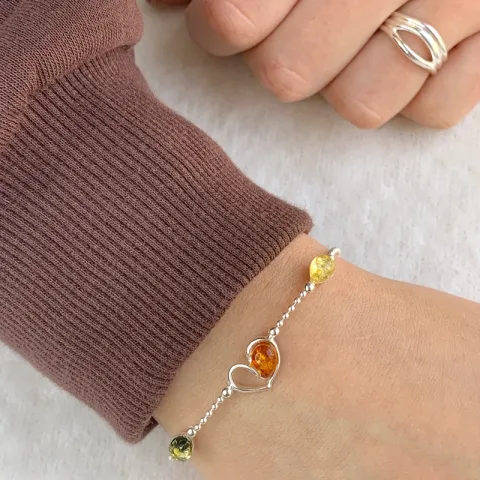 sydän monivärinen meripihka rannekoru hopeaa