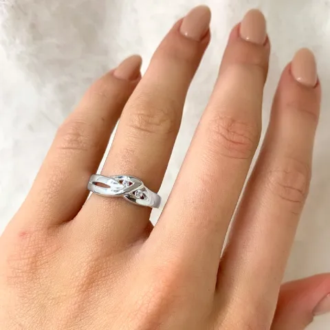 abstrakti sormus hopeaa