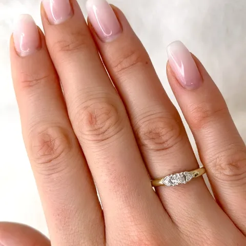 Sydän timantti sormus 9 karaatin kulta ja valkokultaa 0,03 ct