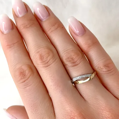 abstrakti briljanttisormus 9 karaatin kulta ja valkokultaa 0,01 ct