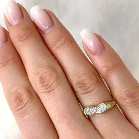 abstrakti briljanttisormus 9 karaatin kulta ja valkokultaa 0,04 ct