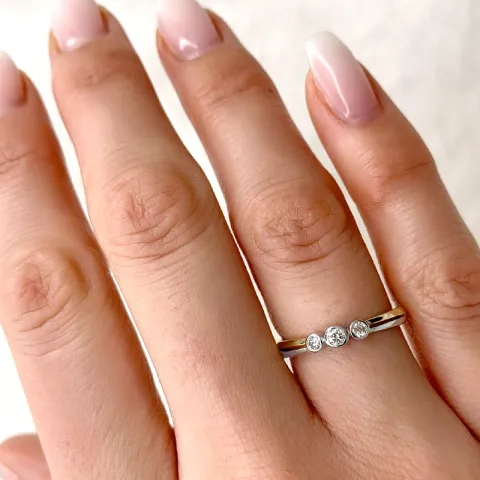 pyöreä timanttisormus 9 karaatin kulta ja valkokultaa 0,12 ct