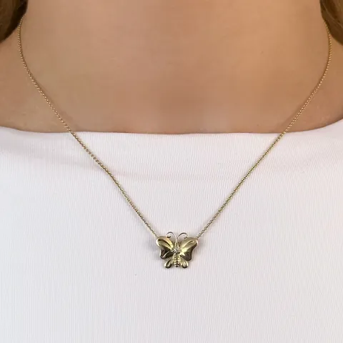 Perhoset timantti riipus 9 karaatti kultaa 0,01 ct