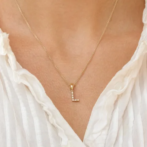 L-kirjain timantti riipus 9 karaatti kultaa 0,03 ct