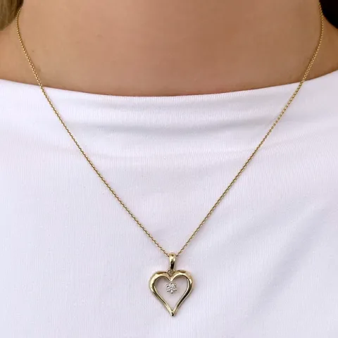 sydän timanttiriipus 9 karaatti kultaa 0,08 ct