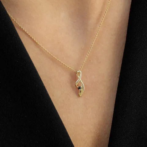 abstrakti musta timantti riipus 9 karaatti kultaa 0,03 ct