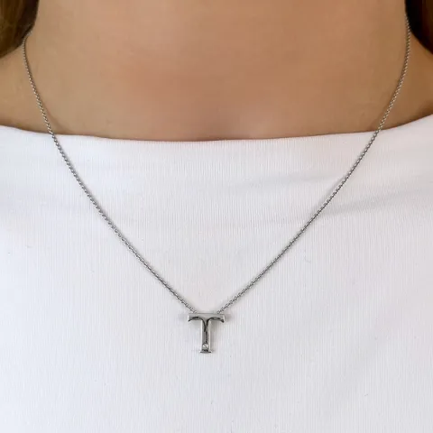 T-kirjain timantti riipus 9 karaatti valkokultaa 0,01 ct