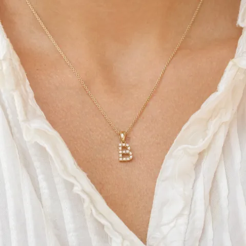 b-kirjain timantti riipus 9 karaatti kultaa 0,084 ct