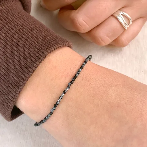 kivi rannekoru obsidian ja 3 hematite.
