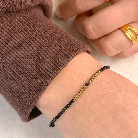 musta rannekoru onyx-kiveä ja hematite.
