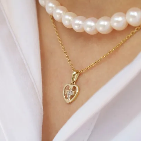 sydän risti riipus  8 karaatin kultaa, jossa on rodium