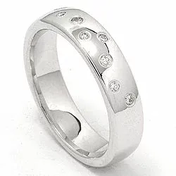 Leveä tähtipöly vihkisormus 14 karaatin valkokultaa 0,126 ct
