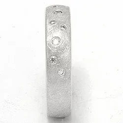 Strukturoitu tähtipöly vihkisormus 14 karaatin valkokultaa 0,126 ct