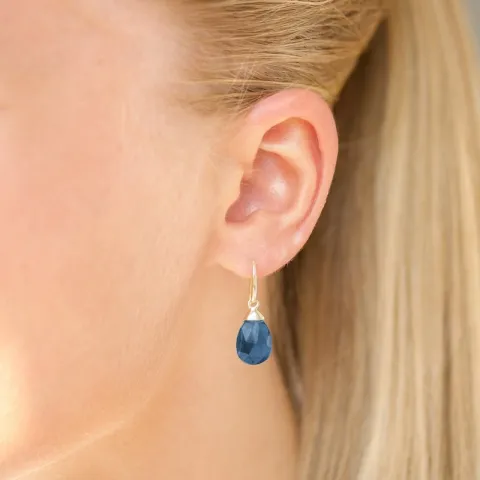 korvarenkaat 9 karaatin kultaa kanssa tummansininen kristalli