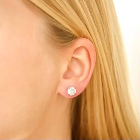 7 mm vedenkestävät zirkoni solitaire-nappikorvakorut  kullattu teräs - OCEANA