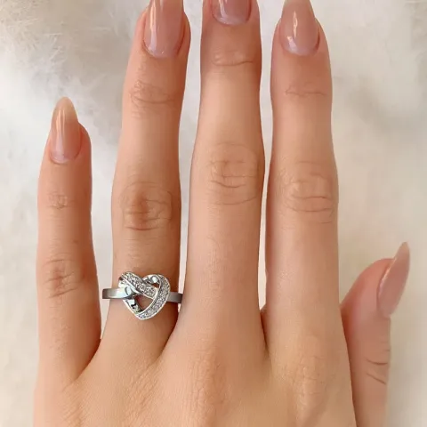 Suuri sormus rodinoitua hopeaa