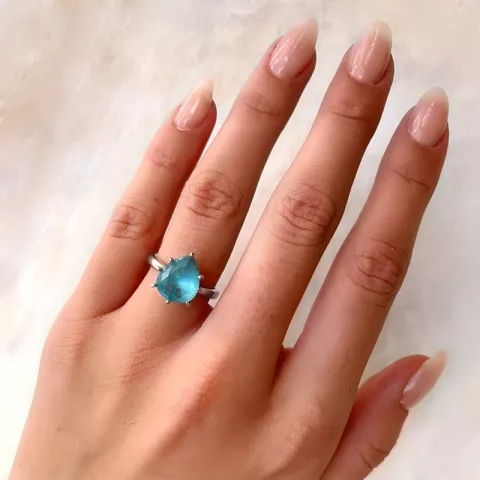 Ovaali sininen sormus hopeaa