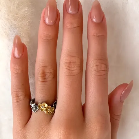 kukka sormus musta rodinoitu hopea kullattua hopeaa