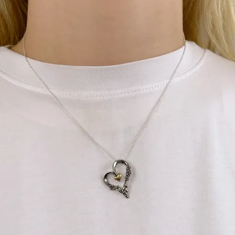 Dark Harmony sydän riipus  musta rodinoitu hopea ja kullattua hopeaa