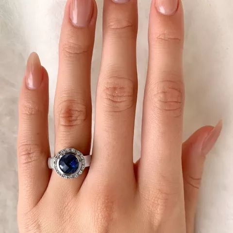 Pyöreä sininen sormus hopeaa