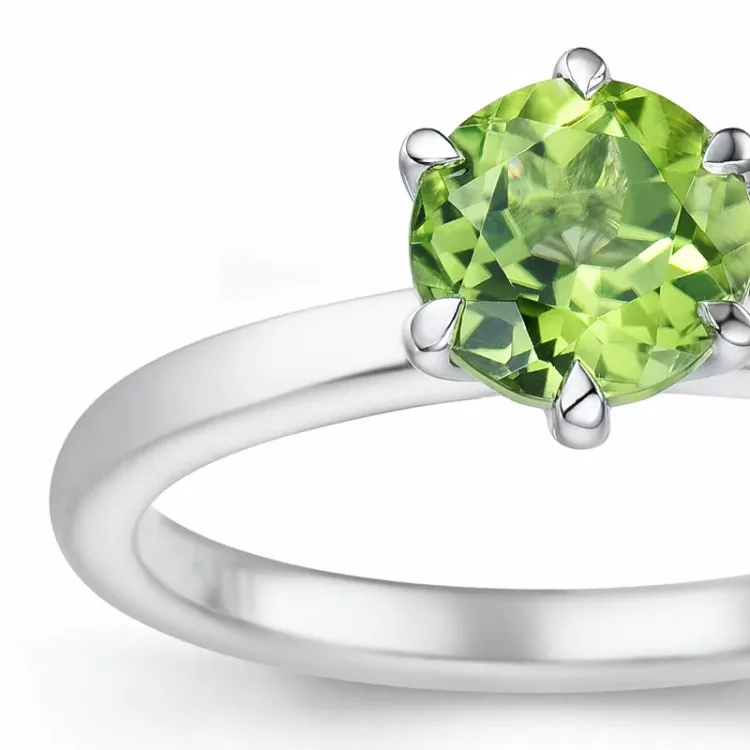 vihreä peridootti solitaire-sormus 14 karaatin valkokultaa 1,27 ct