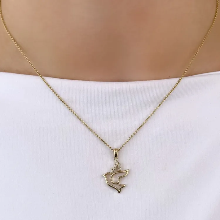 lintuja timantti riipus 14 karaatti kultaa  0,06 ct