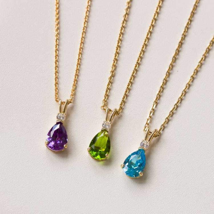 pisara sininen synteettinen topaasi riipus  9 karaatin kultaa - Gold Collection