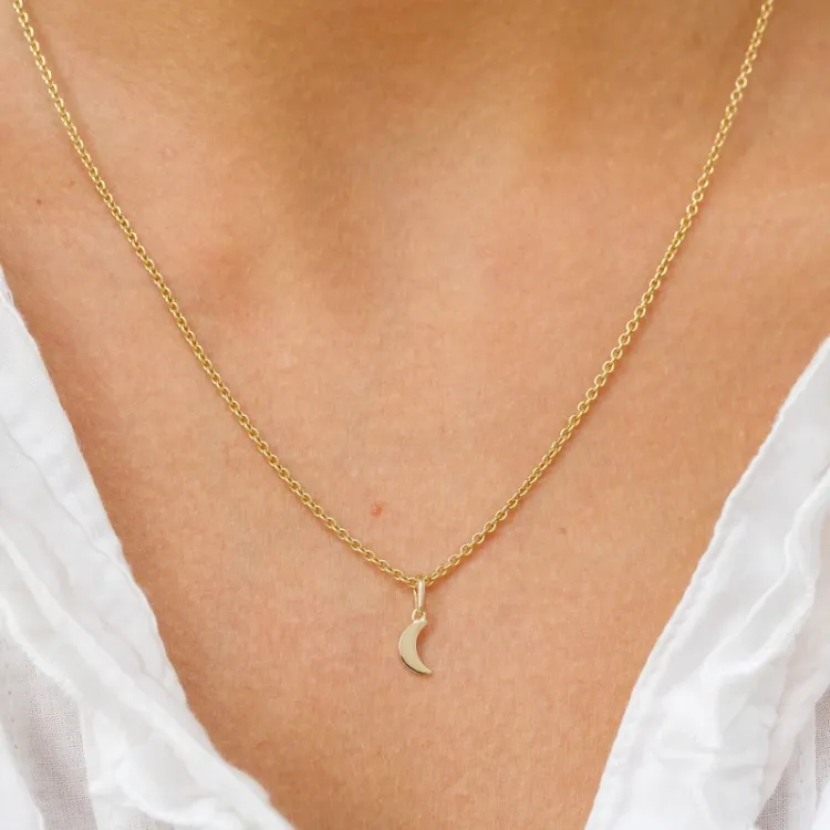 pieni kuu riipus  9 karaatin kultaa - Gold Collection