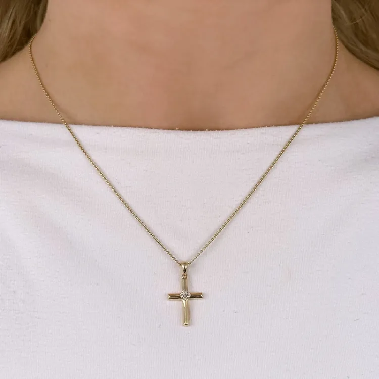 risti riipus 14 karaatti kultaa 0,08 ct