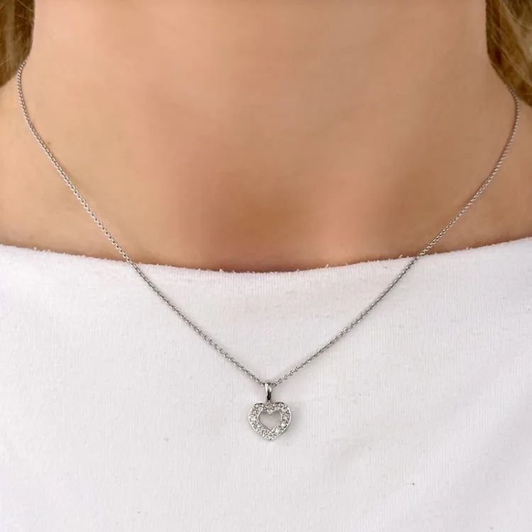 sydän riipus 14 karaatti valkokultaa 0,15 ct