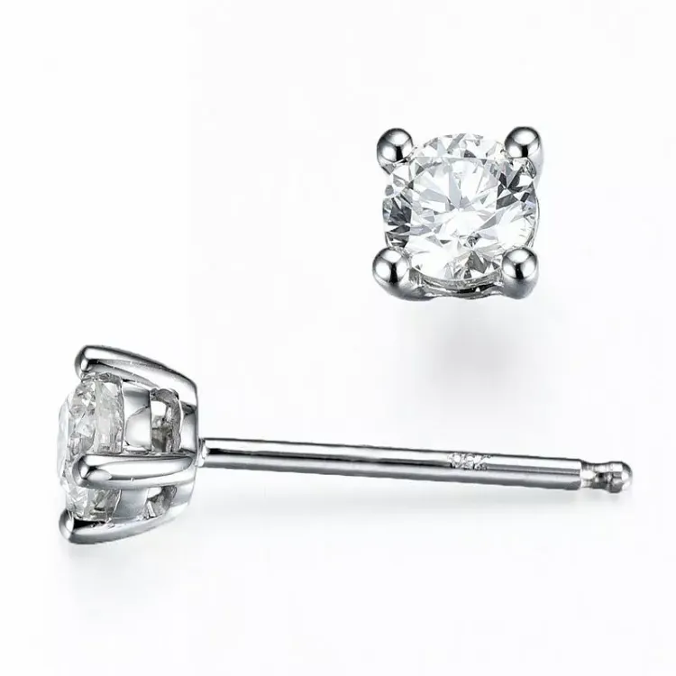 2 x 0,18 ct solitaire-nappikorvakorut 14 karaatin valkokultaa kanssa timantti