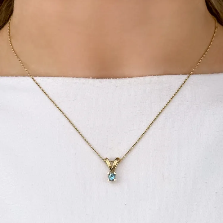 topaasi kultariipus 14 karaatti kultaa 0,22 ct