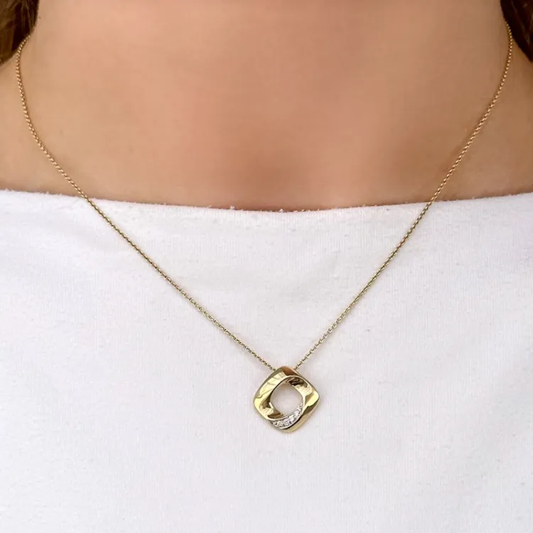 timanttiriipus 14 karaatti kulta ja valkokultaa 0,05 ct