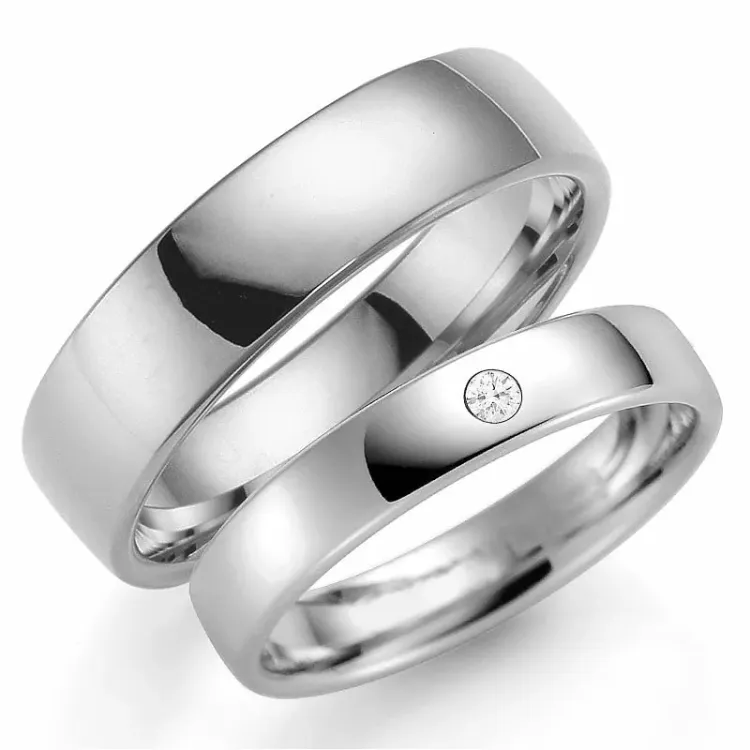 6 ja 4 mm vihkisormusta 14 karaatin valkokultaa 0,03 ct - setit