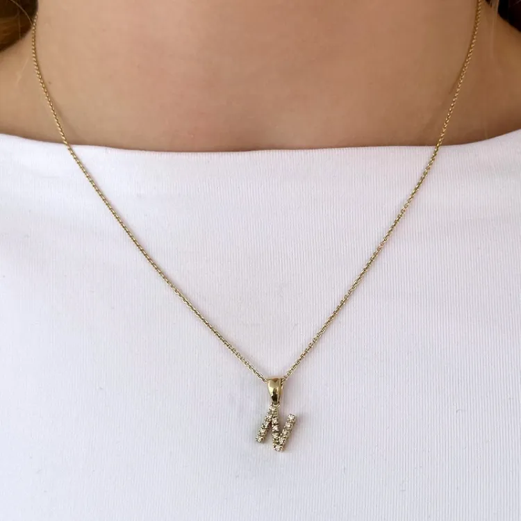 n-kirjain timantti riipus 9 karaatti kultaa 0,088 ct