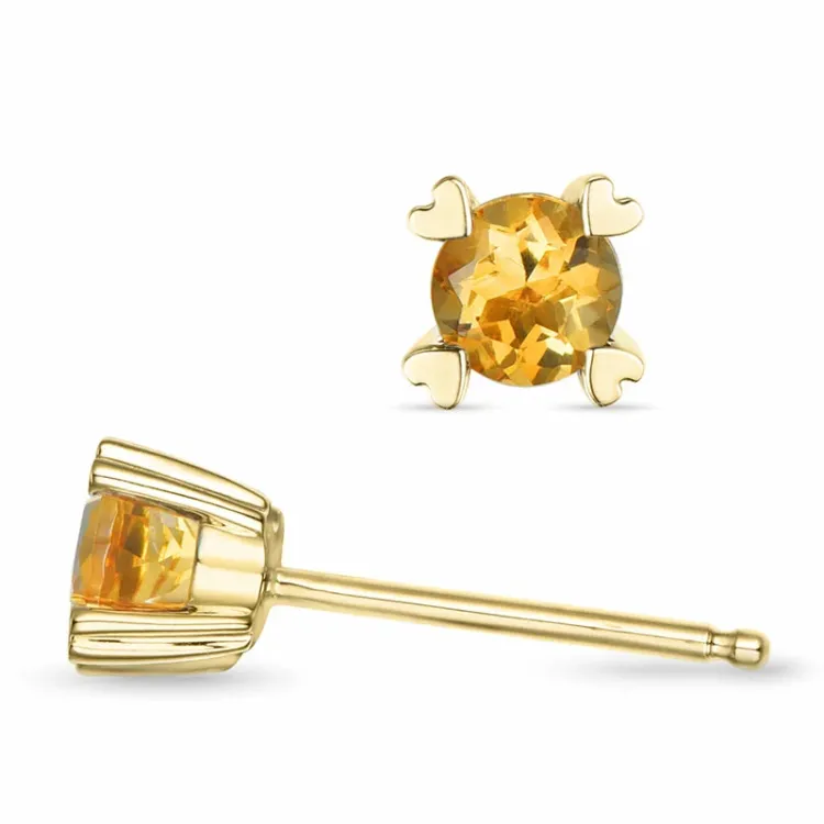 2 x 0,25 ct sitriini solitaire-nappikorvakorut 9 karaatin kultaa kanssa sitriini